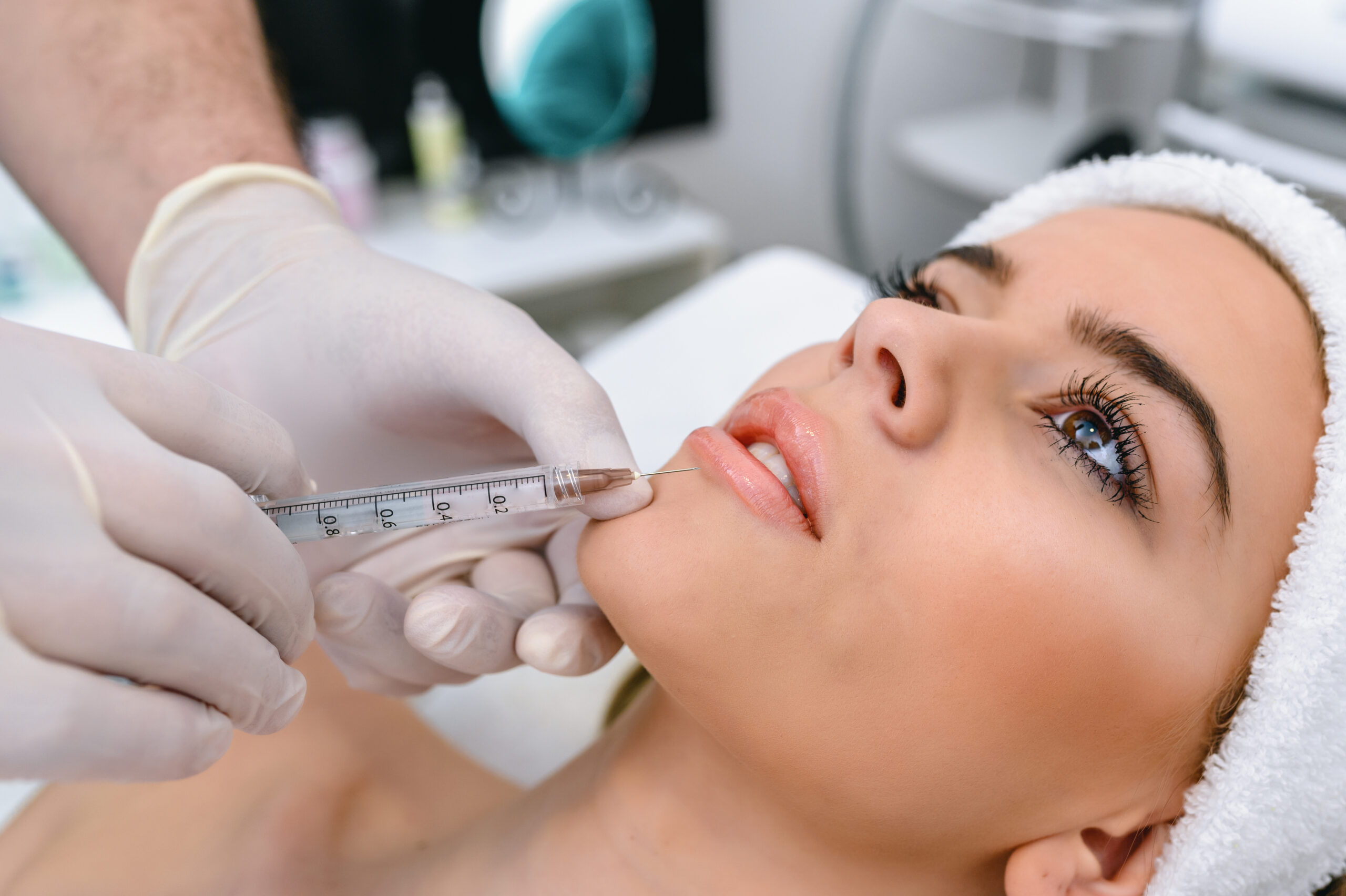 Woman getting lip filler