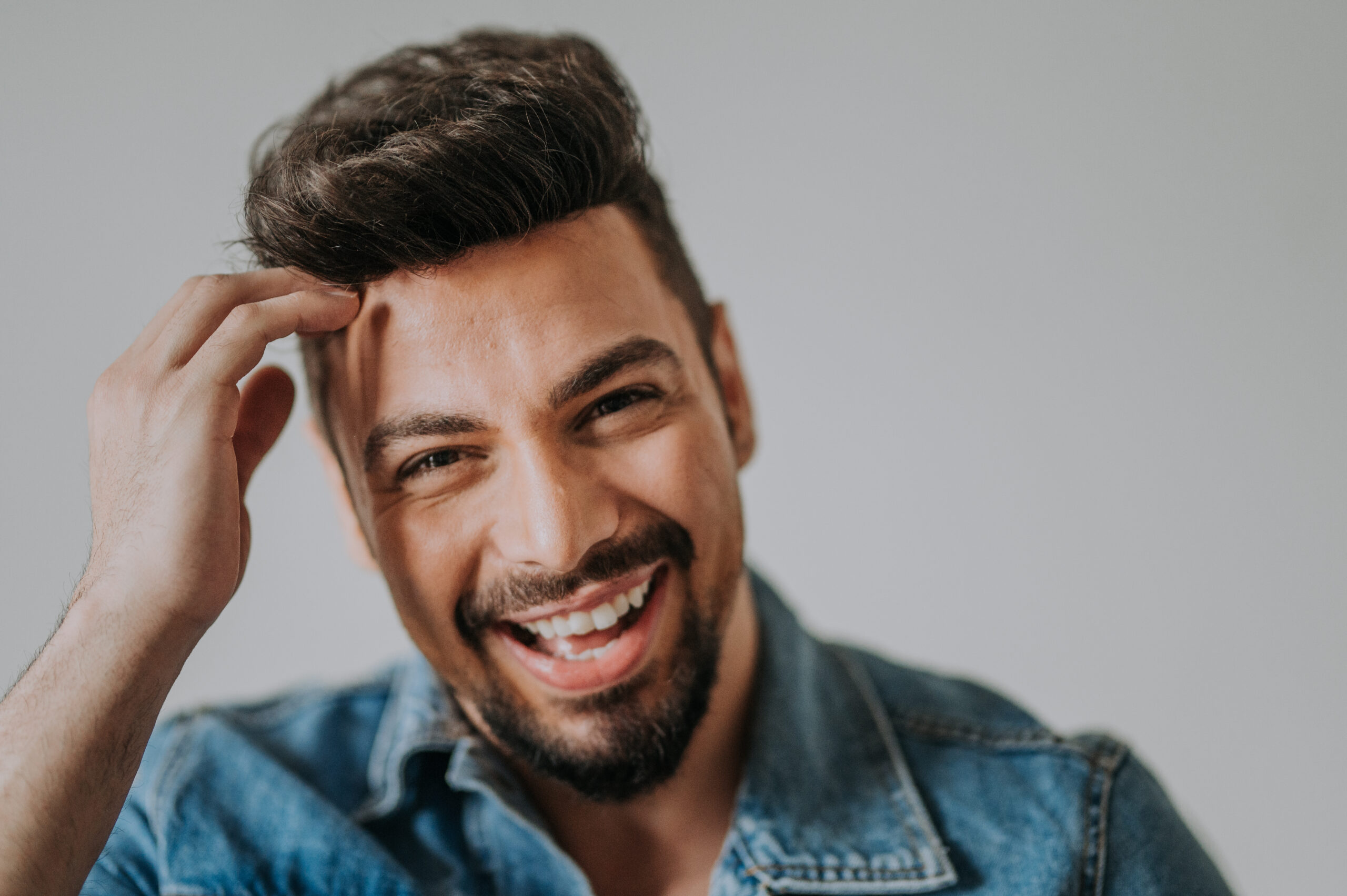 Man face up close smiling