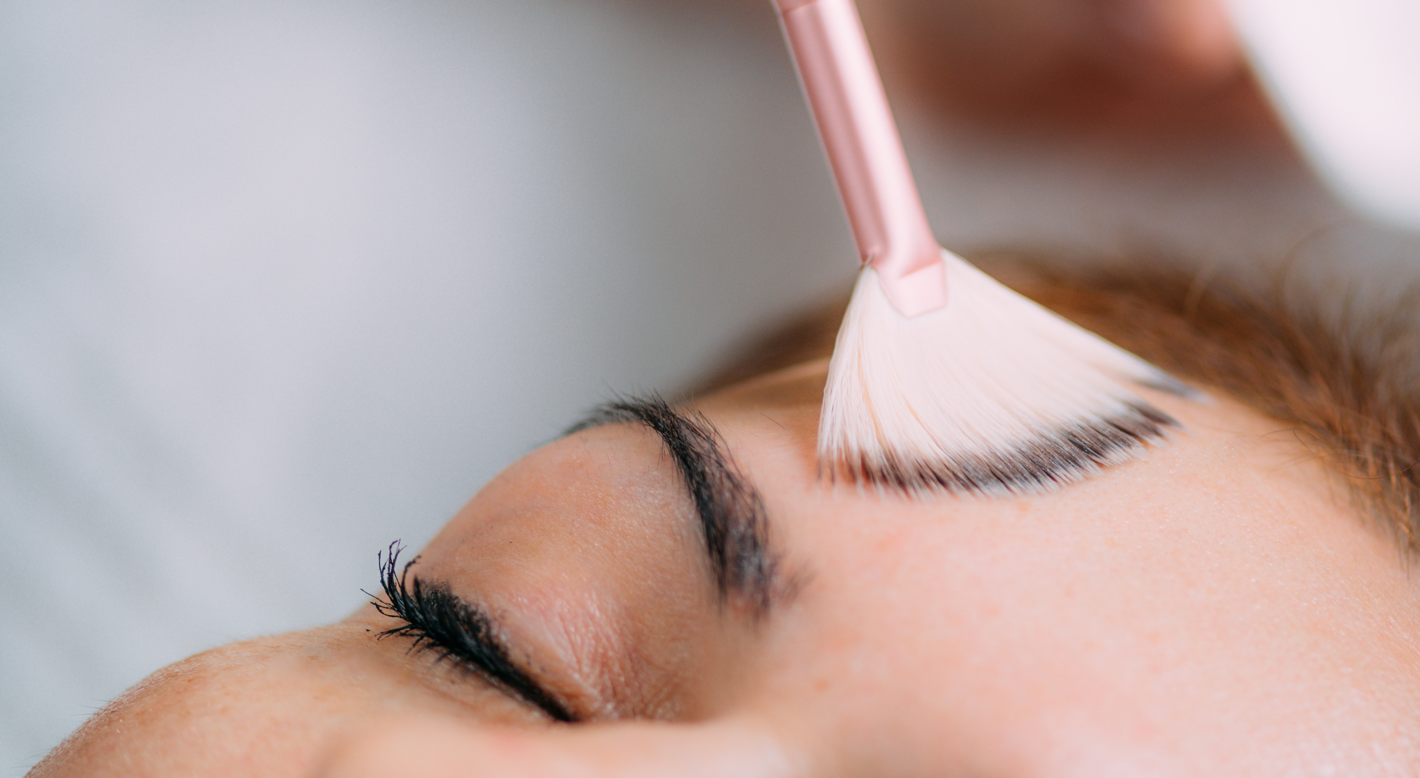Illustration showing a person receiving a chemical peel treatment with the text 'How Long Does a Chemical Peel Take?'