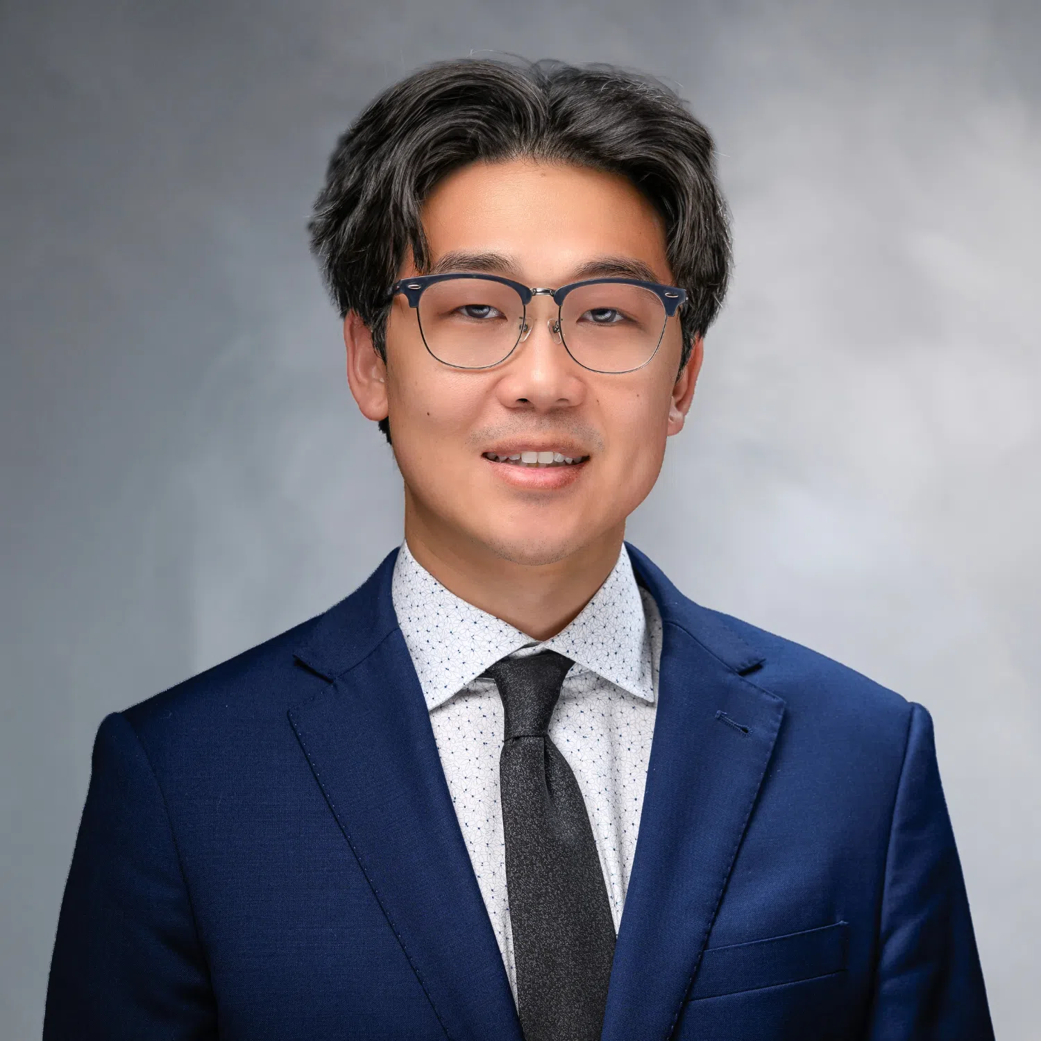 Dr. Alfred Lee, a plastic surgeon at Advanced Institute for Plastic Surgery in the Inland Empire, professional headshot.